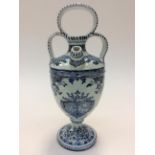 A 19th Century Dutch Delft Armorial, gin pitcher,