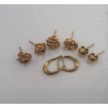 Four pairs of 9 carat gold earrings,