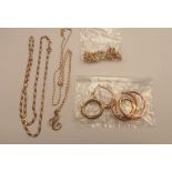 A collection of 9 ct gold jewellery, comprising bracelet, two necklaces, various earrings, etc,