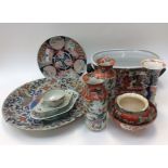 A quantity of mainly Japanese Oriental ceramics; Large dish (A/F) footbath,