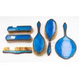 A 1920's midnight blue champleve enamel and copper dressing table set (6)