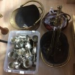 A large collection of brass/copper/pewter ware including two coal shutters, goblets,