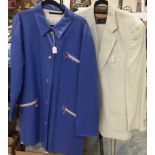 A Nina Ricci cobalt blue full length leather coat with zip pockets and emblem,