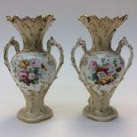 A pair of English porcelain twin handled vases,