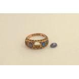 A 9ct gold 19th Century ring with blue faceted stones, (A/F) one stone loose,