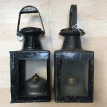 Two hurricane lamps