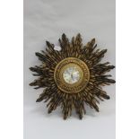 A mid 20th Century Sunray wall clock, gilt case,