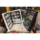 Four stamp albums to include GB Mint sheets
