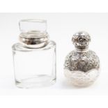 An Edwardian Silver covered glass scent bottle, hobnail cut body, Birmingham 1908,