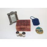 A bead work purse, a leather jewel box with key,