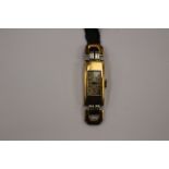 A ladies 18 ct gold Art Deco wrist watch with white metal,