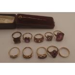 A 9 ct gold collection of six purple stone set dress rings, two 9 ct smoky quartz rings,