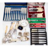 A collection of plated flatware to include boxed set of fish eaters, knives, bread forks,