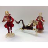 A Venetian Murano glass horse and a pair of Venetian glass pair of 18th Century figures (red and