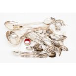A collection of flatware to include ladles,