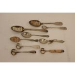 A pair of George II spoons, four salt spoons,