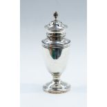 An Edward VIII silver Pepperette, Birmingham 1936, of pedestal form, having a wooden filled base,