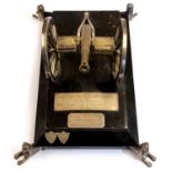 A Victorian presentation trophy in the form of a field gun inscribed "Presented by Sheykh A H