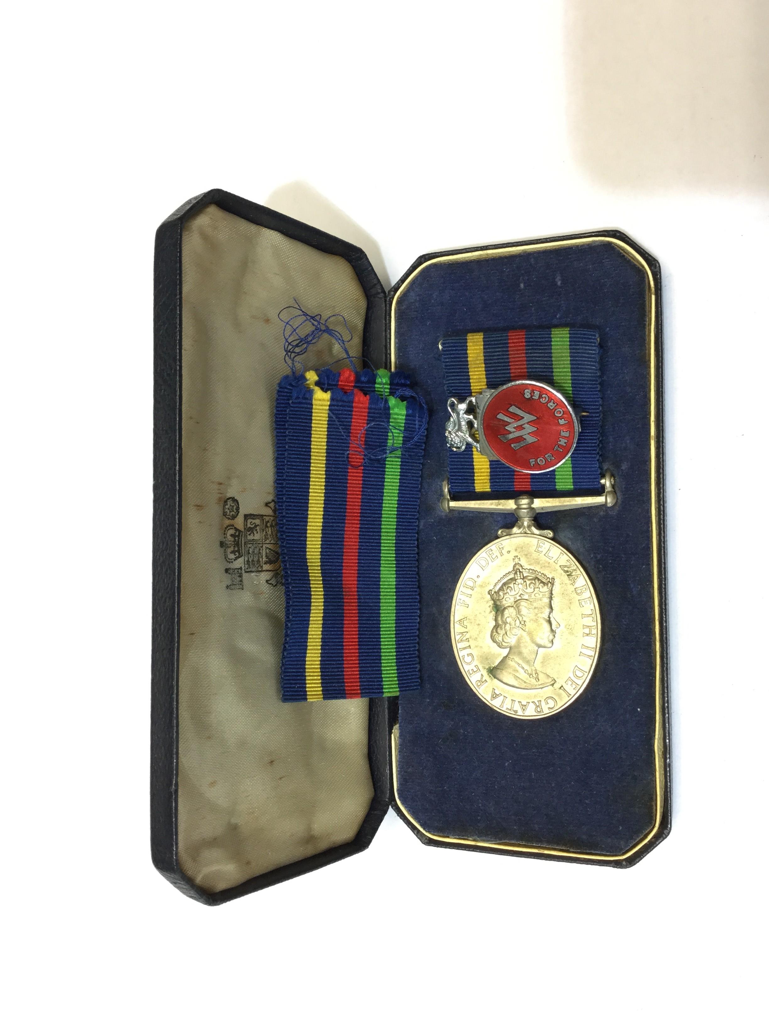 ER II British Civil Defence medal in case of issue (British Version) unnamed and Womens Voluntary
