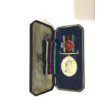 ER II British Civil Defence medal in case of issue (British Version) unnamed and Womens Voluntary