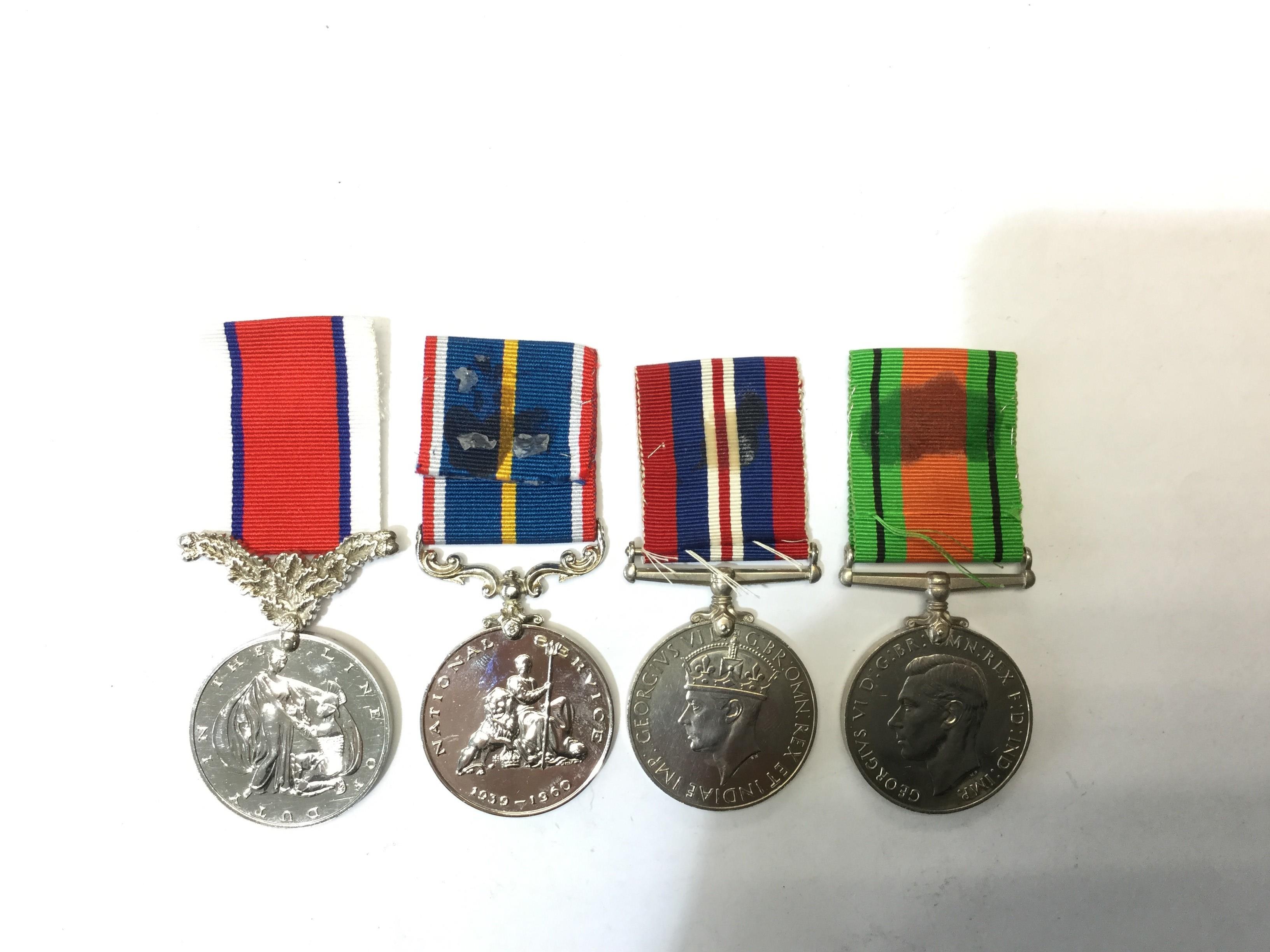 WW2 British War Medal and Defence Medal (ribbons glued in place) and two unofficial medals,