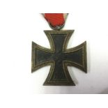 WW2 Third Reich Eisernes Kreuz 2. Klasse. 1939 Iron Cross 2nd class. Complete with ribbon.