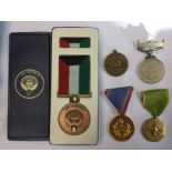 A collection of medals to include: Defence of Kuwait 4th grade,