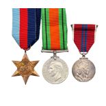 WW2 British 1939-45 Star, Defence Medal and an ERII Coronation Medal in box of issue.