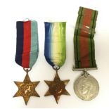 WW2 British 1939-45 Star, Atlantic Star and Defence Medal. All with ribbons.