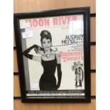 A Moon River Musical Score. Framed with front and back glazing. Depicting Audrey Hepburn.