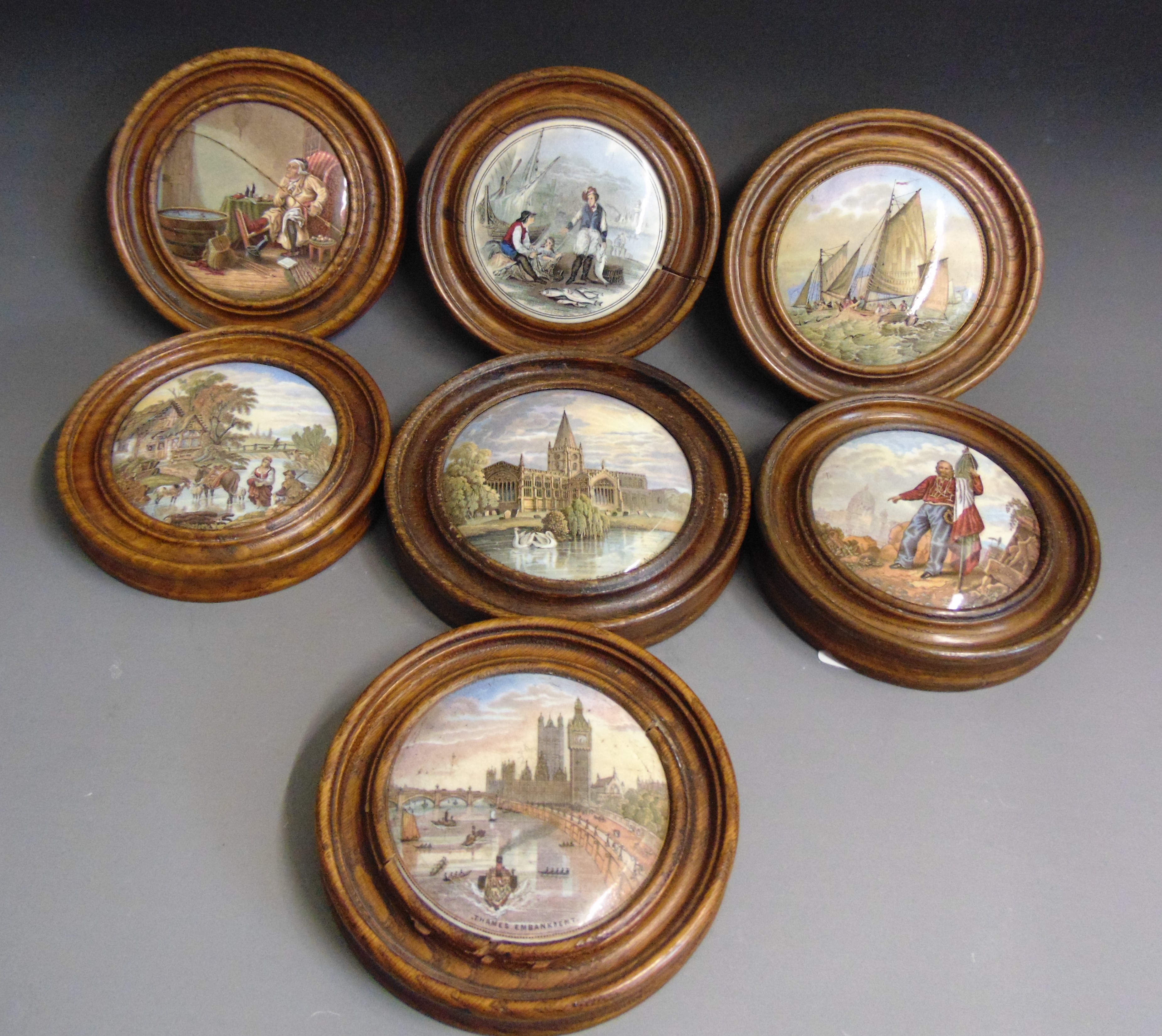 Seven Staffordshire Prattware polychrome pot lids,