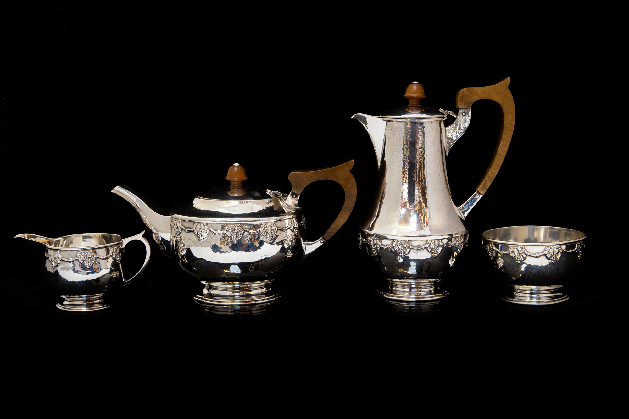 A George V four piece tea set comprising teapot, h