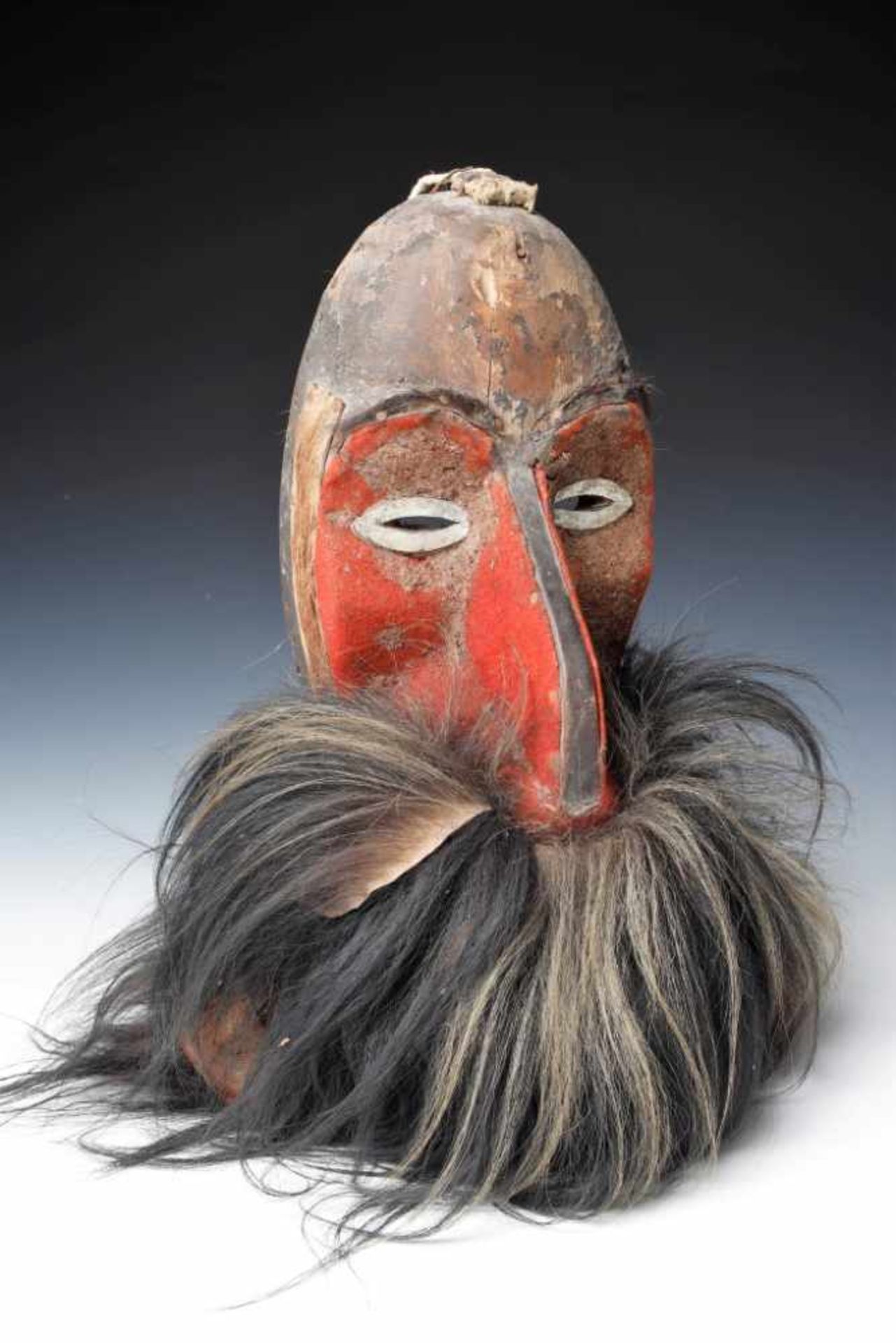 DANCING MASK wood carved, covered with leather & fur, Papua Niugini, 18th century, H: 36 cm / W: