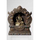 MILAREPA IN SHRINEcopper repousse shrine, with firegilt bronze,Tibet or Mongolia 19th century,H: