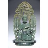 GREEN JADE BUDDHAjade,China, Qing DynastyH: 26,5 cmbuddha on a double lotus,with open work mandorla