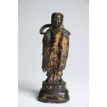 SCHOLARbronze with traces of Lacquer and goldChina, 16th centuryH: 23 cm