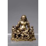 ARHAT HVASHANGbrass bronzeTibet, 18th centuryH: 10 cmSeated on a stepped plinth, his shoulders