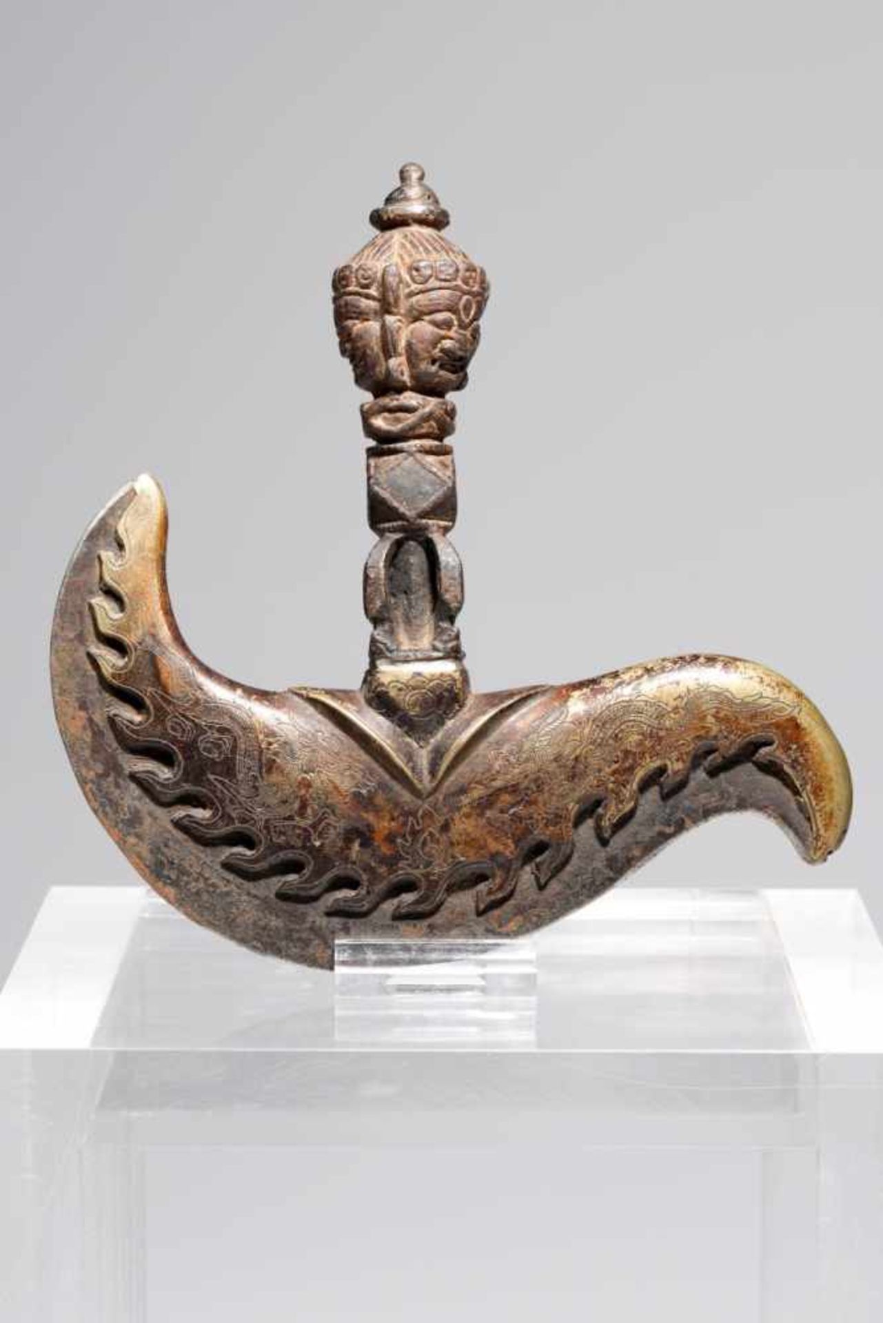 RITUAL CHOPPER (KARTTRKA)bronze and iron,Tibet, 19th century,H: 17 cmThe hooked crescent-shaped iron
