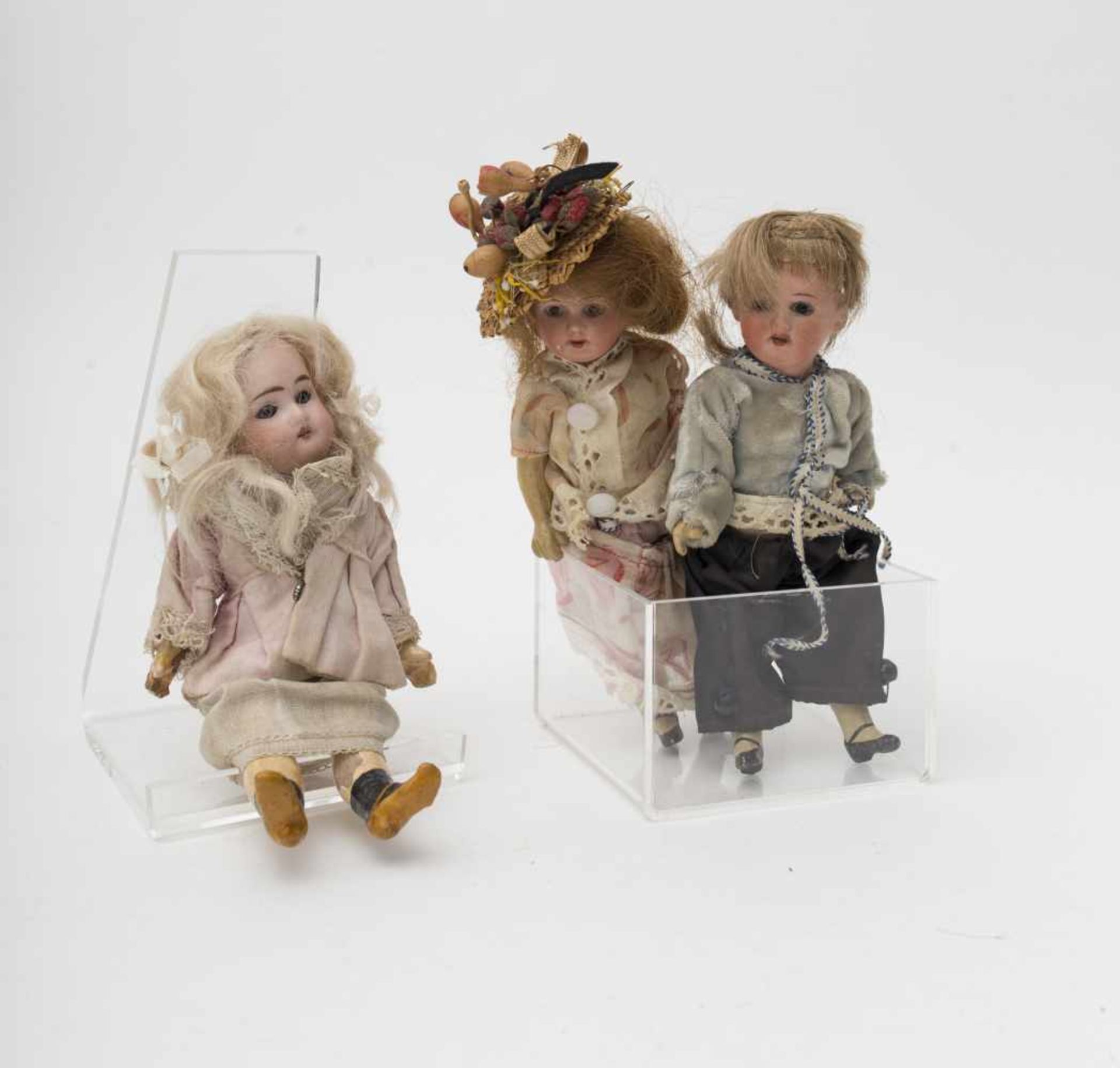 Trio of little dolls German, with biscuit head and composition body, H=17-18cm.