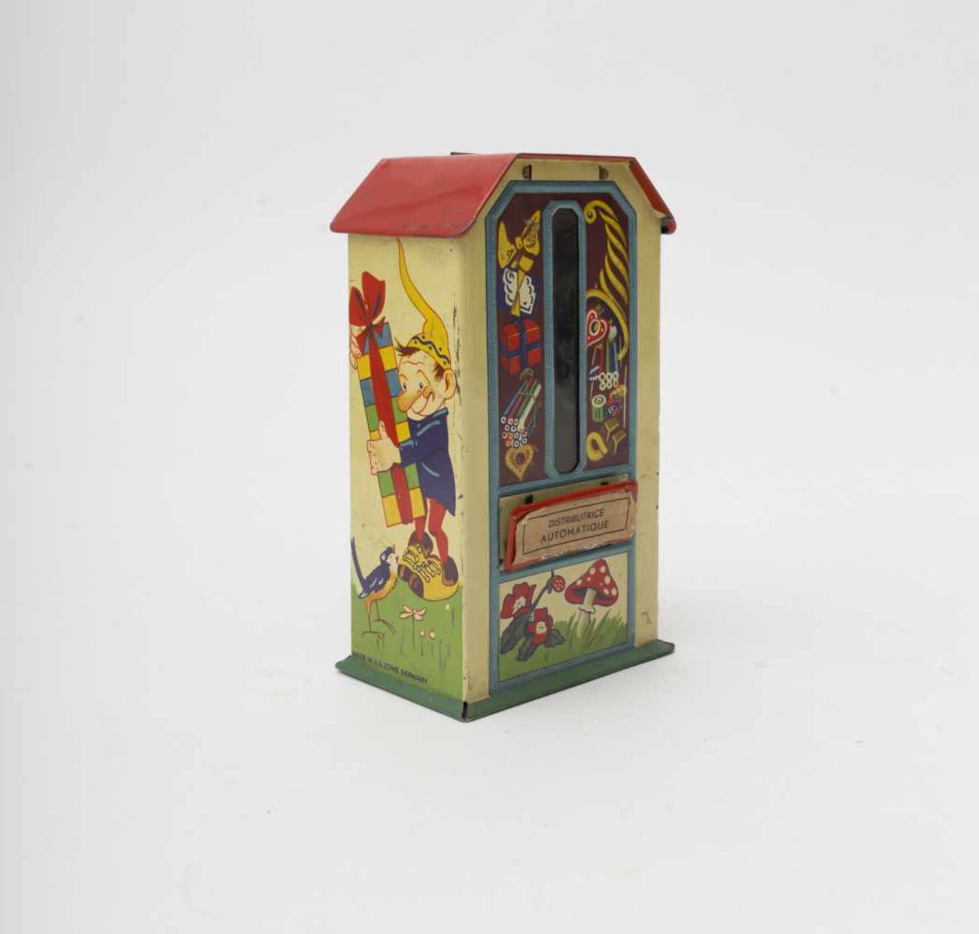 Candy dispenser Coin operated, lithographed metal, from the 1930’s, H=14cm.