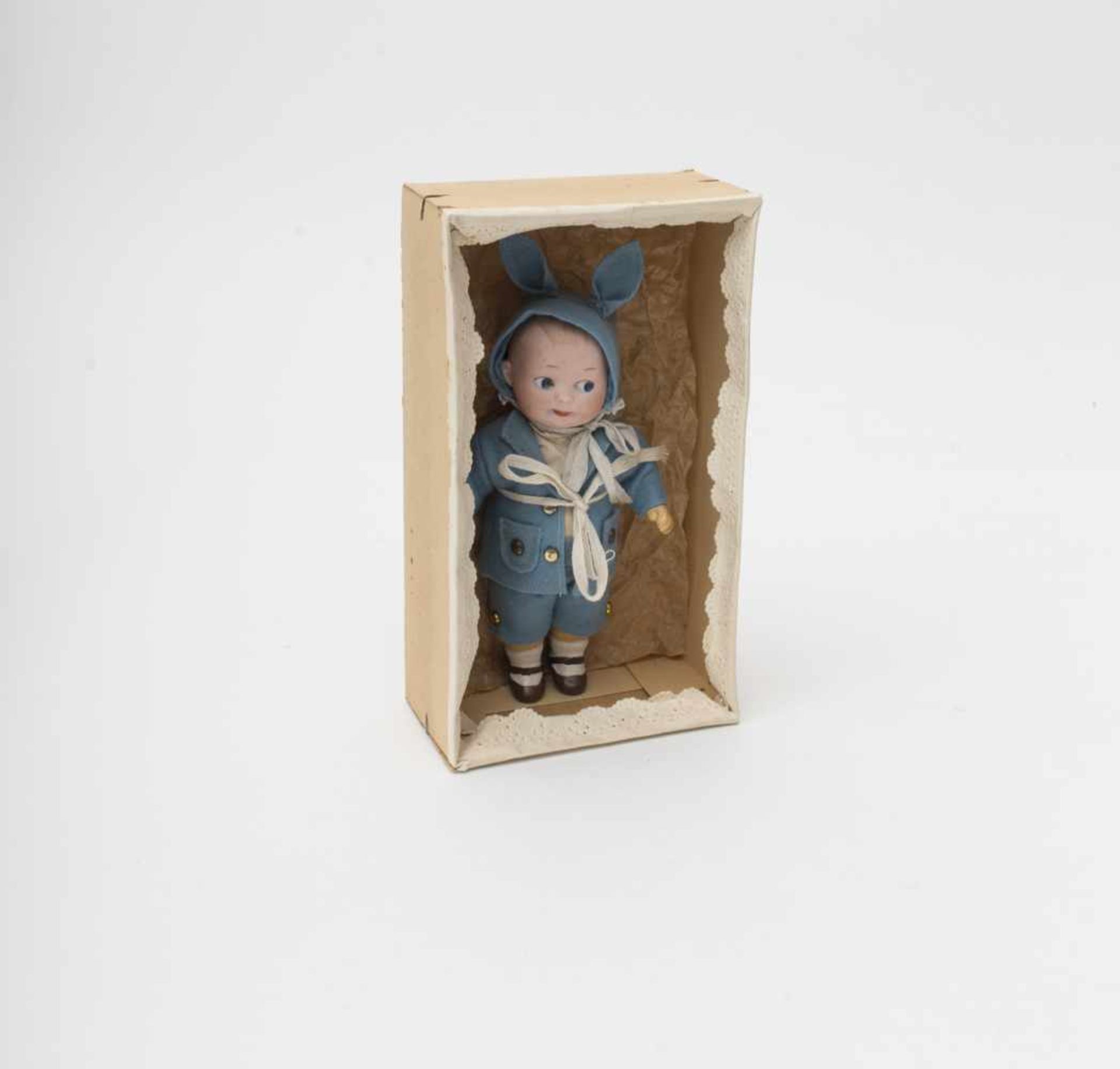 Little GOOGLIE With biscuit head, of German make, composition body, original clothes, shown in its