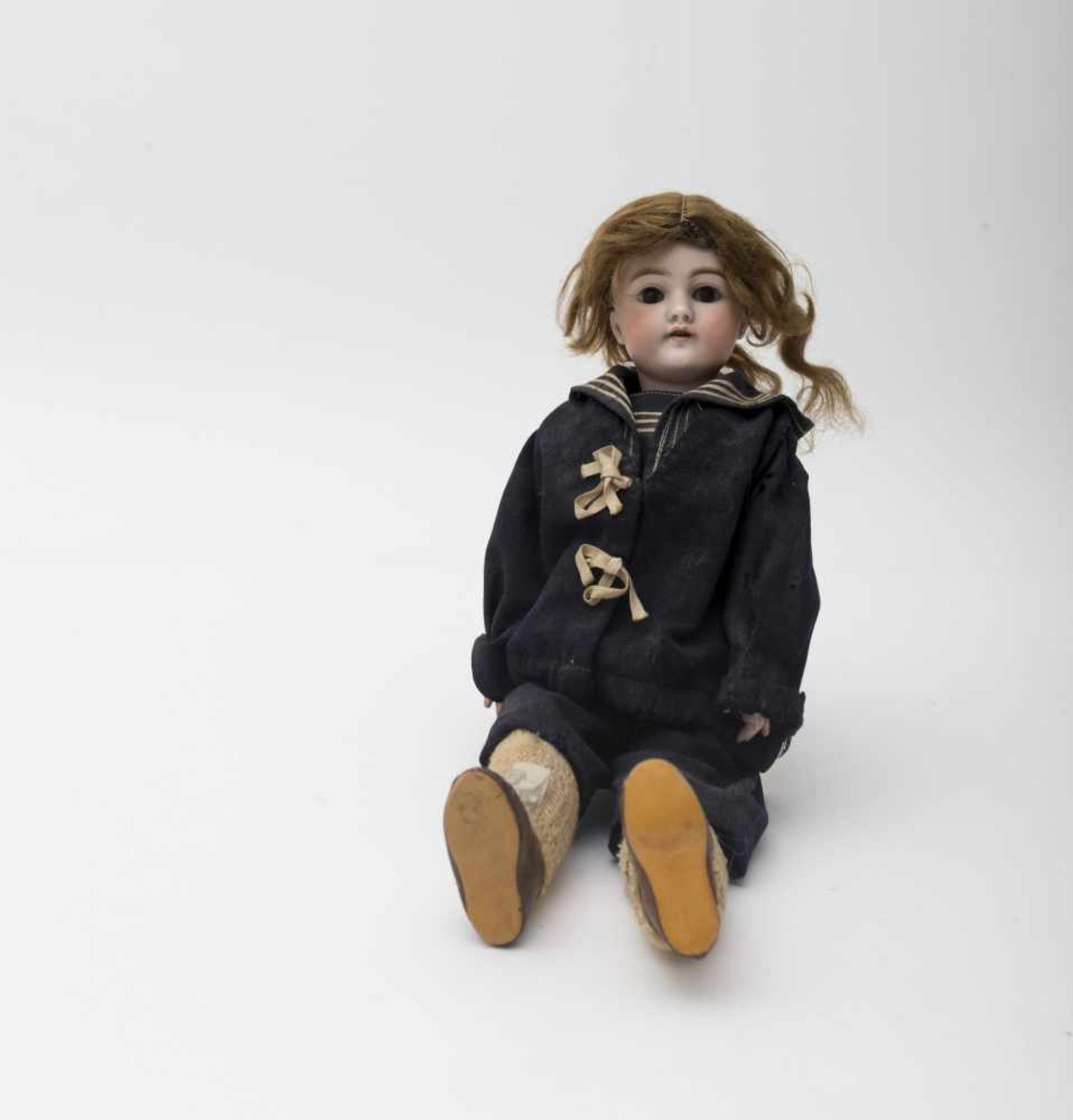 Doll With biscuit head, open mouth, branded “79” size 5, brown sleeping eyes, antique sailor’s