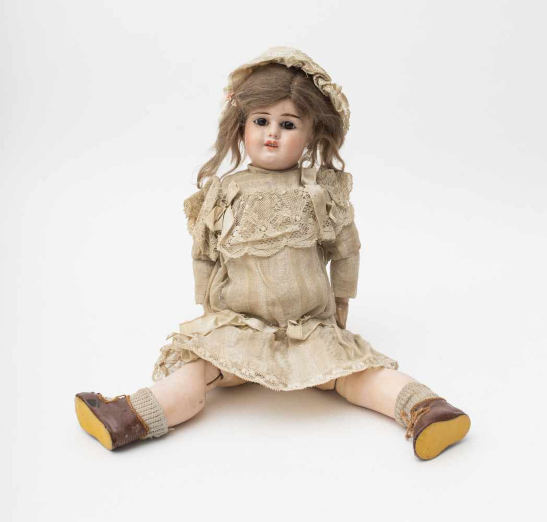 Doll With EDEN BEBE-type composition head, open mouth, branded “5” with red stamp, fixed brown eyes,