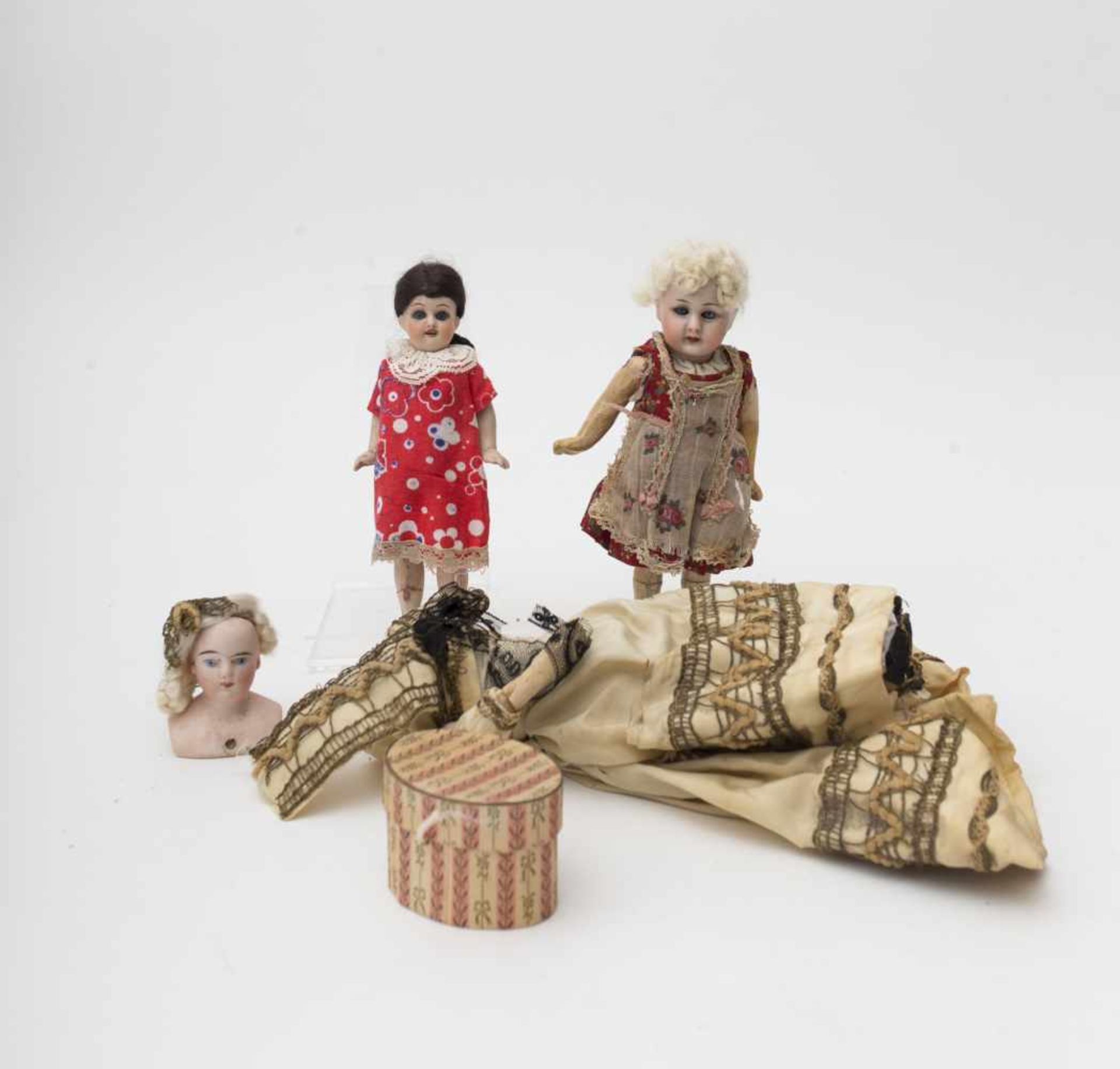 Three dolls With biscuit head and composition and biscuit body, one of FG make, with sleeping eyes