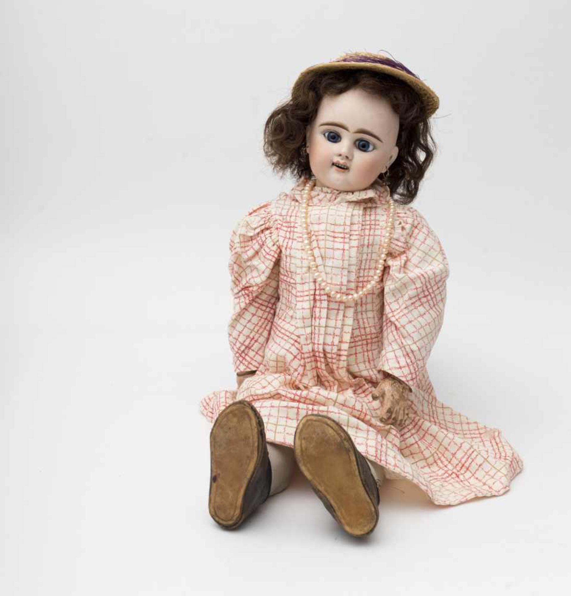 Doll With biscuit head, open mouth, branded “E 9 D” (Etienne DENAMUR), fixed blue eyes,