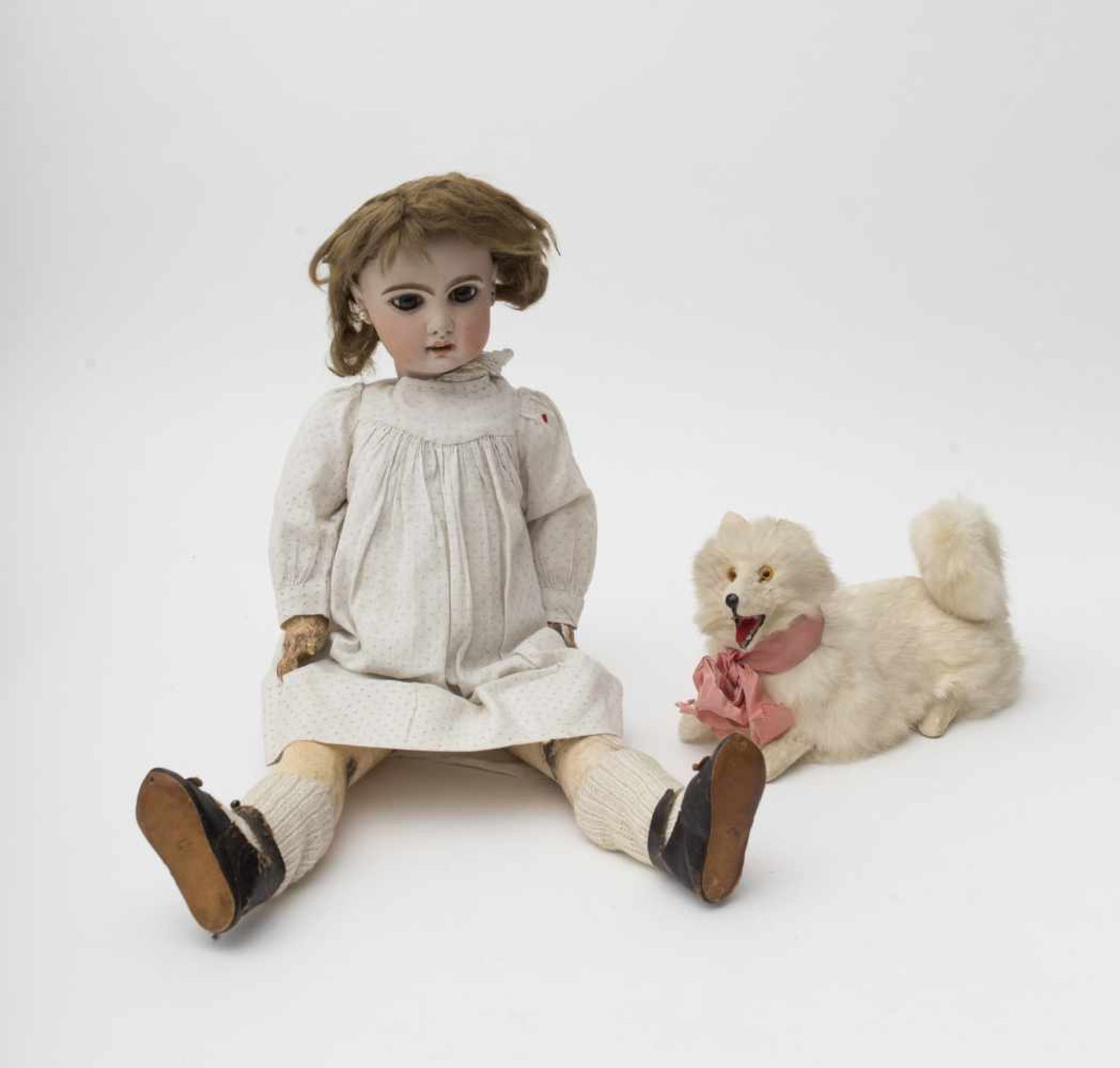 Doll With biscuit head, open mouth, SFBJ make based on a JUMEAU mould, branded “8 X”, fixed brown