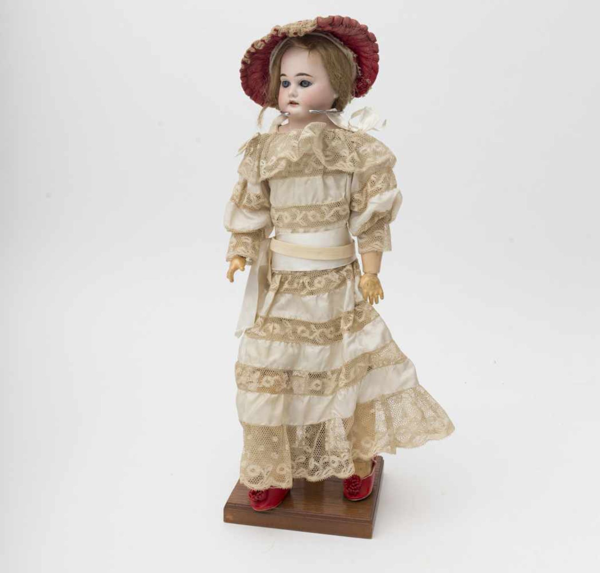 German doll With biscuit head and torso, open mouth, branded “3200 AM DEP” articulated kidskin and