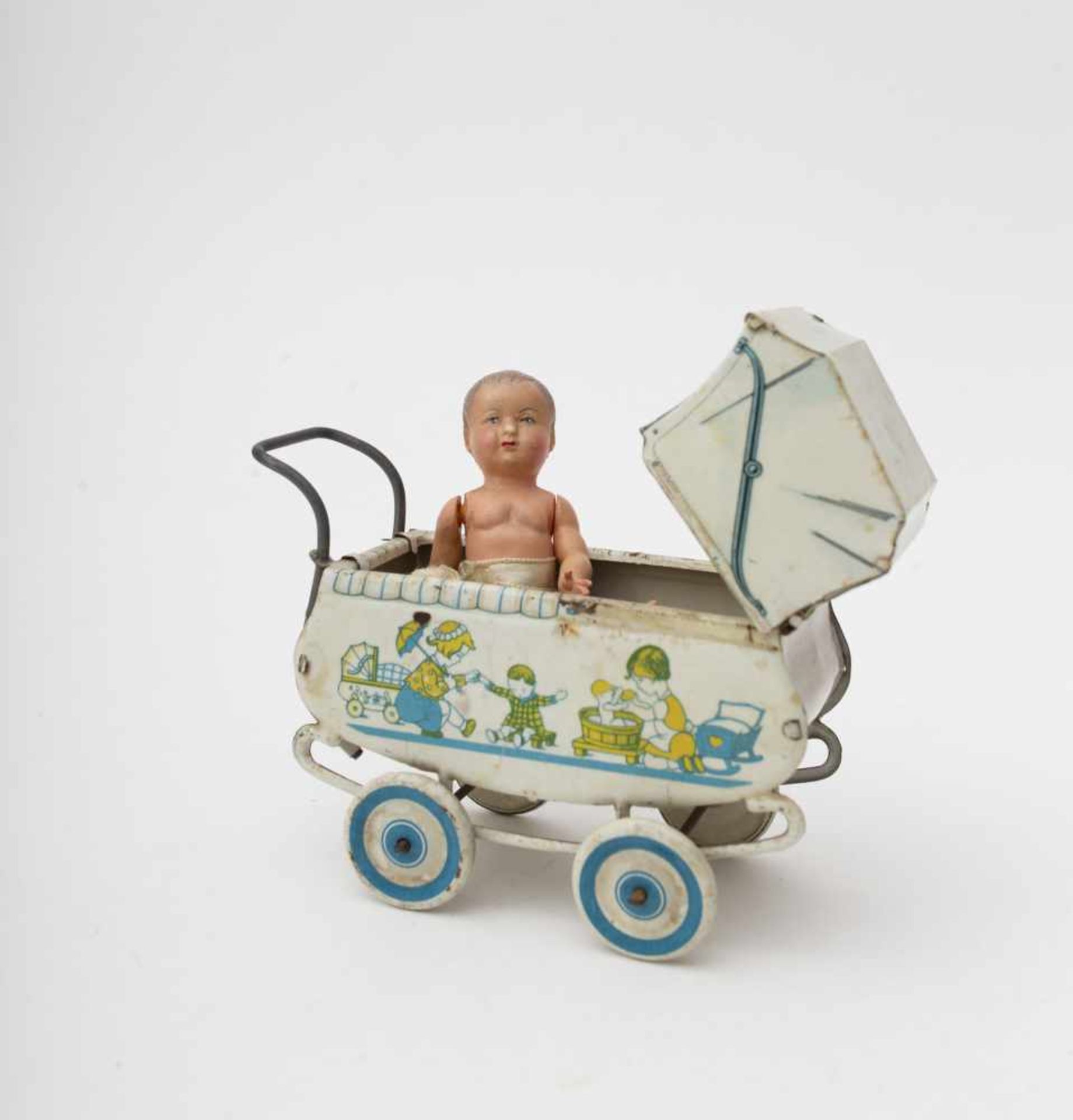 Mignonette pram 1920’s, sheet metal painted with a stencil, décor of children, with celluloid