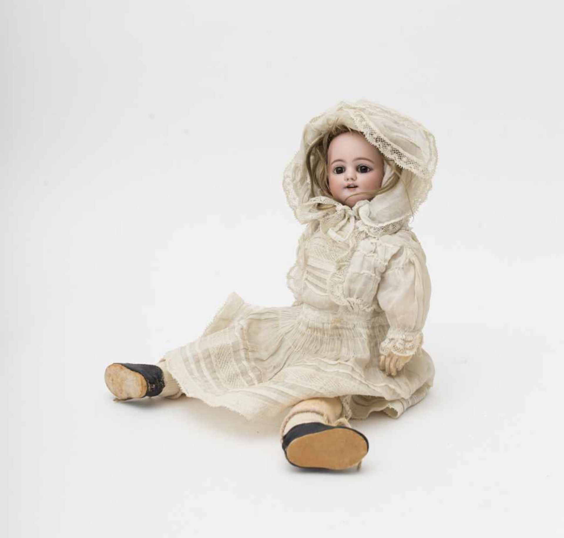 Doll With biscuit head, open mouth, branded “S & H DEP”, fixed brown eyes, articulated composition