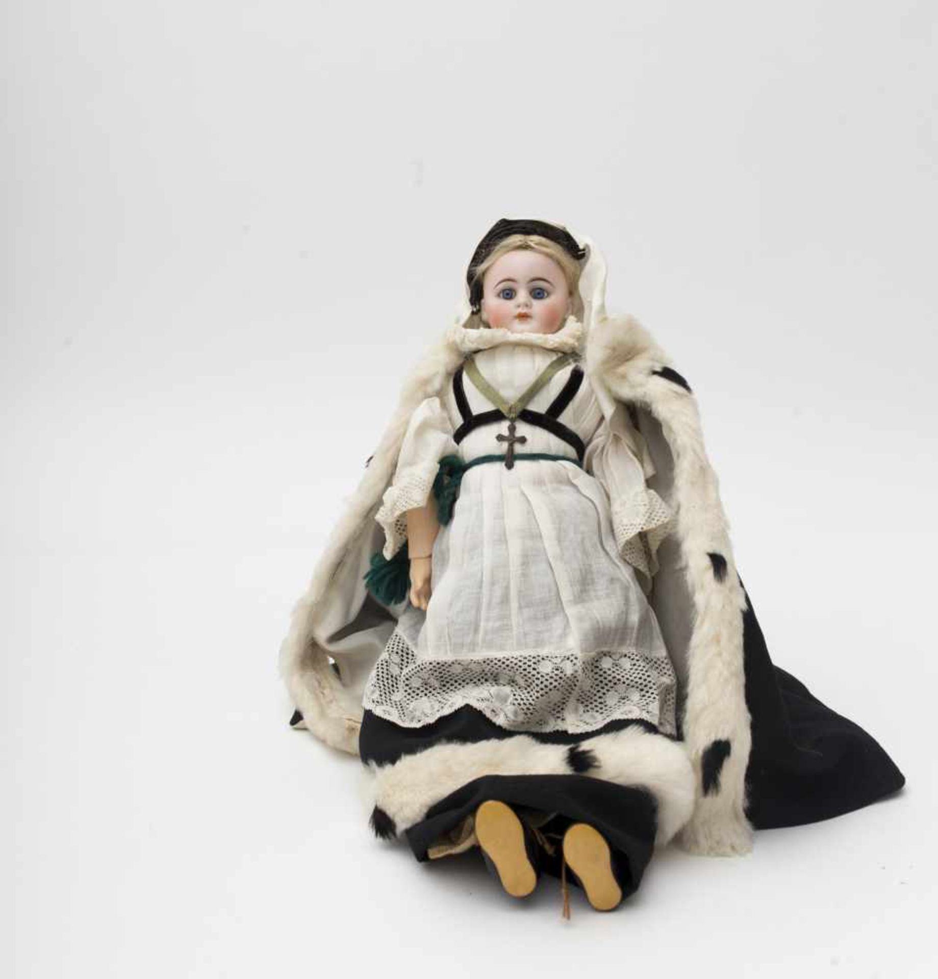 Doll With biscuit head and torso, closed mouth, fixed blue eyes, original articulated kidskin and